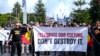 FILE - Aboriginal groups protest against what they say is a lack of detail and consultation on new heritage protection laws, after Rio Tinto destroyed ancient rock shelters for an iron ore mine, in Perth, Australia, Aug. 19, 2021.
