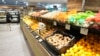FILE - A man shops in a supermarket in Sydney on May 9, 2023. Food prices in Australia have increased by more than 7% in the past year.