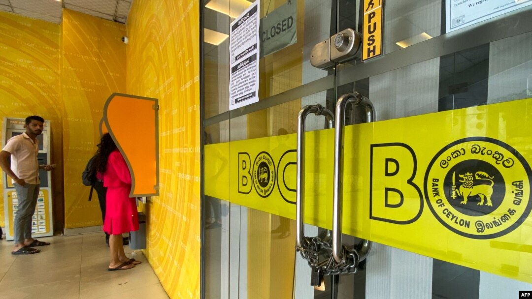 FILE - A branch of the state-owned Bank of Ceylon (BOC) is seen padlocked and shut in Colombo, Sri Lanka, March 1, 2023, amid a strike to protest high taxes.
