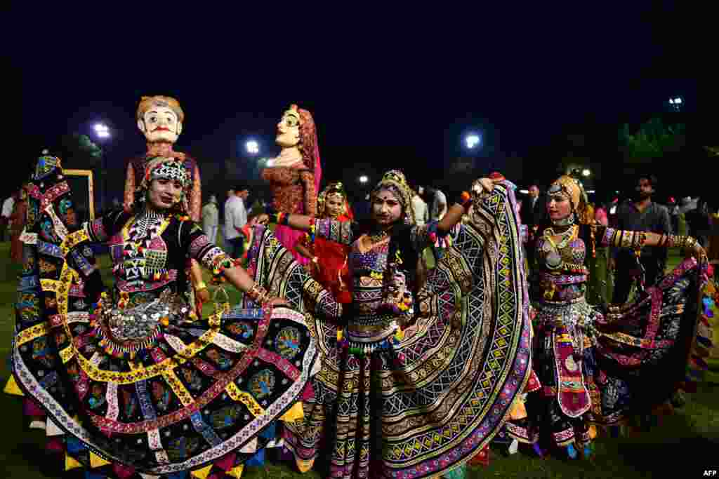 Dancers perform during the celebrations to mark Holi, the spring festival of colors, in Ahmedabad, India.