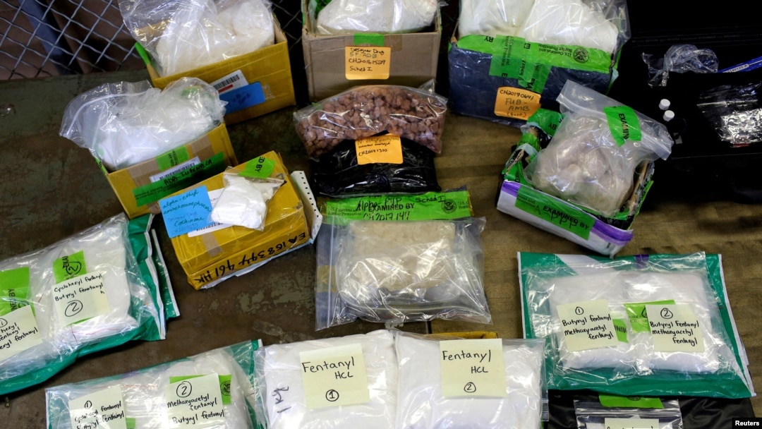 FILE - Plastic bags of fentanyl are displayed on a table at the U.S. Customs and Border Protection area at the International Mail Facility at O'Hare International Airport in Chicago, Nov. 29, 2017.