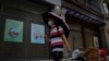 China Cuts Power to Factories, Homes as Reservoirs Fall 