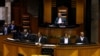 FILE - Chief Justice Mogoeng Mogoeng speaks in Parliament in Cape Town, South Africa, Feb. 15, 2018. 