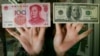 贸易战阴影下中国经济再现放缓信号