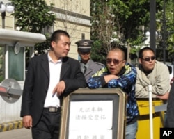 小区的把门人