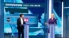英国保守党的党魁竞选电视辩论，目前在党内民意调查支持当中领先的现任外相卓慧思(右)与前任财相辛伟诚(左)