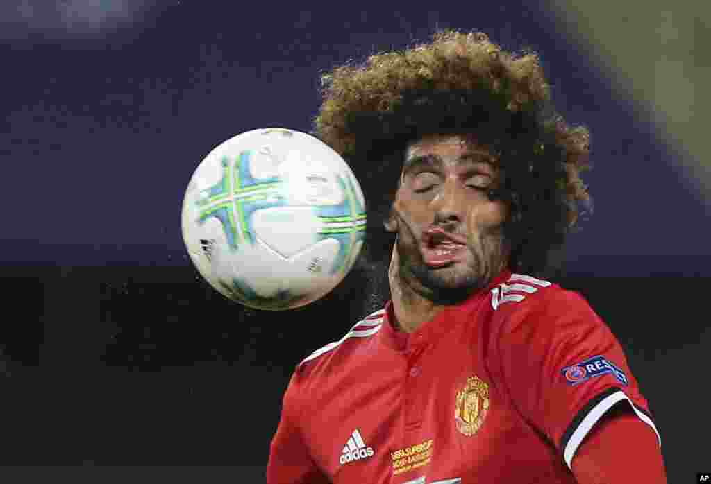 Manchester United's Marouane Fellaini heads the ball during the UEFA Super Cup final soccer match between Real Madrid and Manchester United at Philip II Arena in Skopje, Macedonia, Aug. 8, 2017.