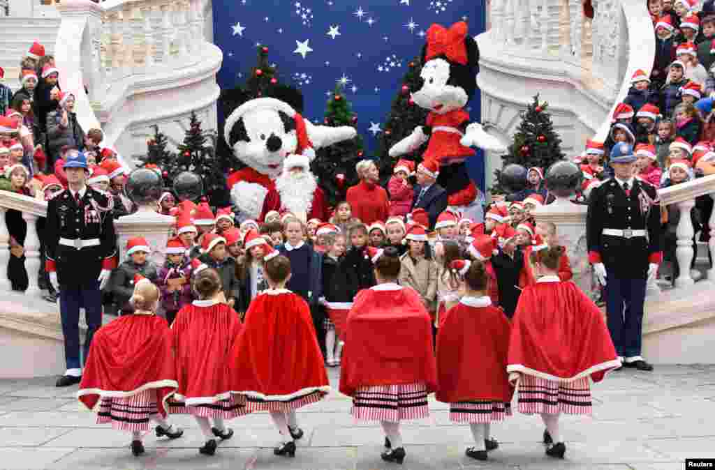 Prince Albert II of Monaco and his wife Princess Charlene attend the traditional Christmas tree ceremony at the Monaco Palace as part of Christmas holiday season in Monaco.