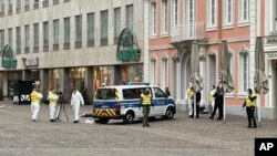 Police officers are pictured at the scene of an incident in the city of Trier, Germany, Dec 1, 2020.