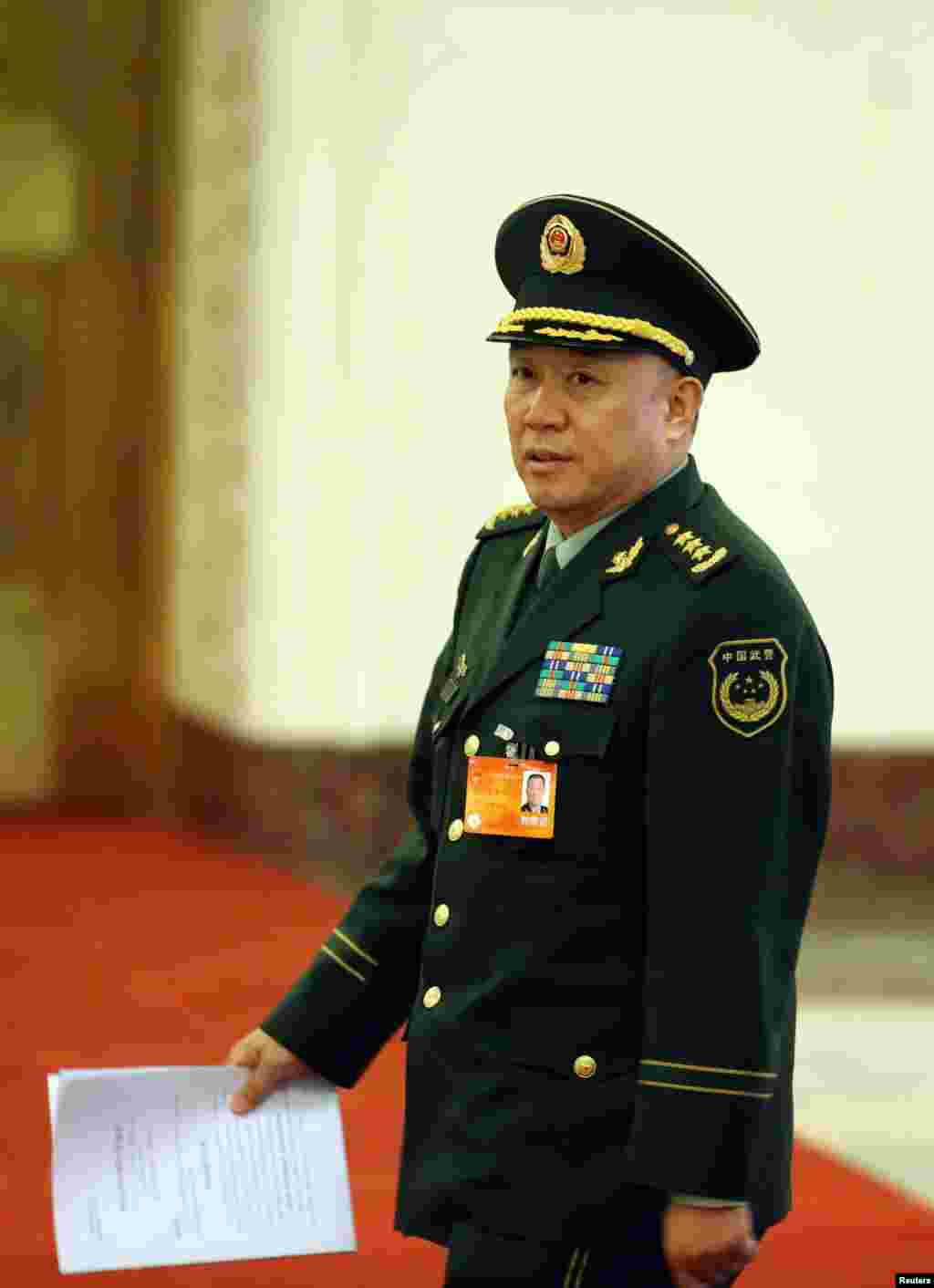 2014年3月10日，中国武警部队司令员王建平在北京开会。 2016年11月29日， 中国国防部新闻发言人杨宇军说，王建平因涉嫌受贿犯罪，被中国军事检察机关立案侦查。王建平被认为是已经落马的前中共中央政法委书记周永康的亲信。他担任武警部队司令员时，周永康是他的直接上司。王建平也是中共&ldquo;十八大&rdquo;后中国军警系统首位落马的现役上将，此前落马的中国中央军委副主席徐才厚、郭伯雄以及原空军政委田修思等虽是上将军衔，但是被查时都已经退役。此前，10月27日晚间播出的中央电视台《新闻联播》用29分钟报道中共十八届六中全会，镜头逐一扫过按姓氏笔画数而坐的197名中央委员，画面上未出现中央委员和军委联合参谋部副参谋长王建平上将。此前，8月26日，香港南华早报声称王建平于8月25日在四川成都视察期间被军方纪检人员带走，其妻子及秘书则于同日在北京被带走。南华早报引用知情人士的消息说，王建平因为违反党纪被带走。