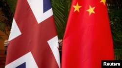 图为中英两国国旗。（资料照片）