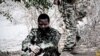 A screen grab from a video clip posted by Al-Shabab purports to show a soldier being executed with two gunshots to the head. 
