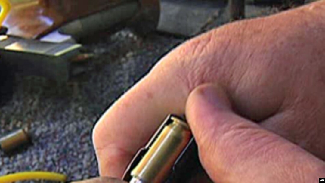 Loading a pistol magazine