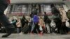 Amtrak passengers walk to their gates in New York's Pennsylvania Station, Nov. 25, 2015.