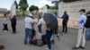 Members of the media gather outside a hotel where members of the African National Congress (ANC) National Executive Committee are meeting to decide the fate of President Jacob Zuma, in Pretoria, South Africa, Feb. 12, 2018.