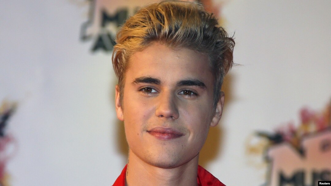 FILE - Canadian singer Justin Bieber arrives for the NRJ Music Awards ceremony at the Festival Palace in Cannes, France.