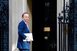 Britain's Health Secretary Matt Hancock arrives in Downing Street in central London on May 1, 2020, for the daily novel coronavirus COVID-19 briefing.