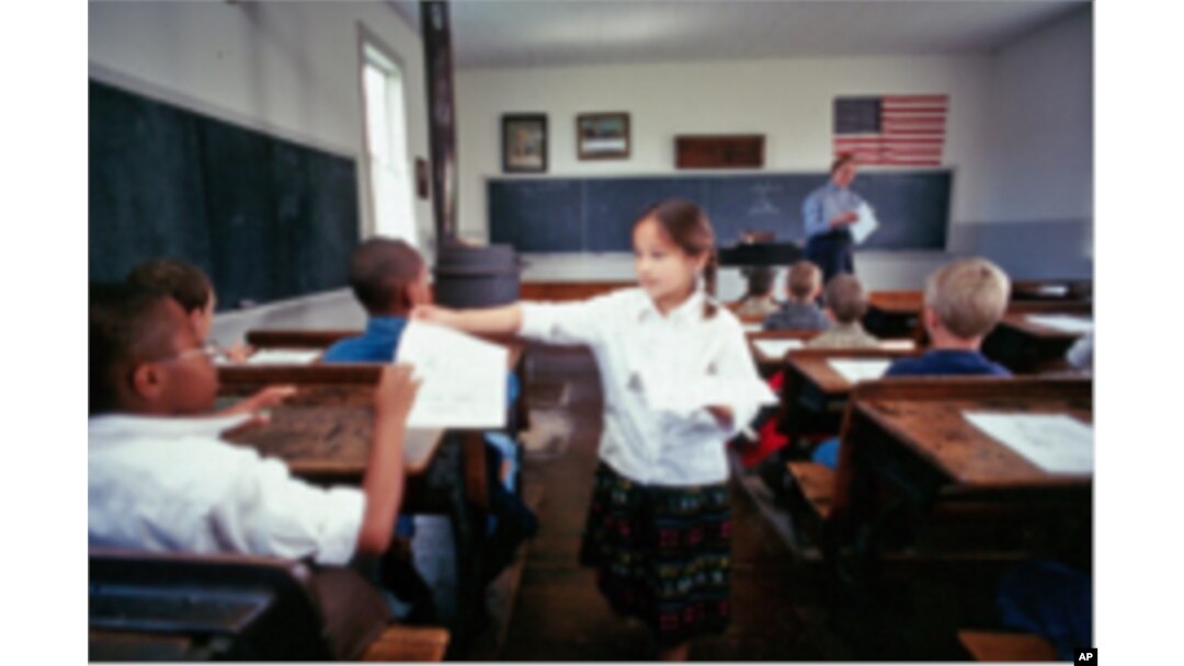 There's only one thing wrong with this old-fashioned one-room schoolroom at the Ag Hall of Fame: The U.S. flag has 50 stars!