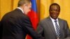 Zimbabwean President Emmerson Mnangagwa greets Russian Foreign Minister Sergey Lavrov before their meeting in Harare, Zimbabwe, March 8, 2018. 