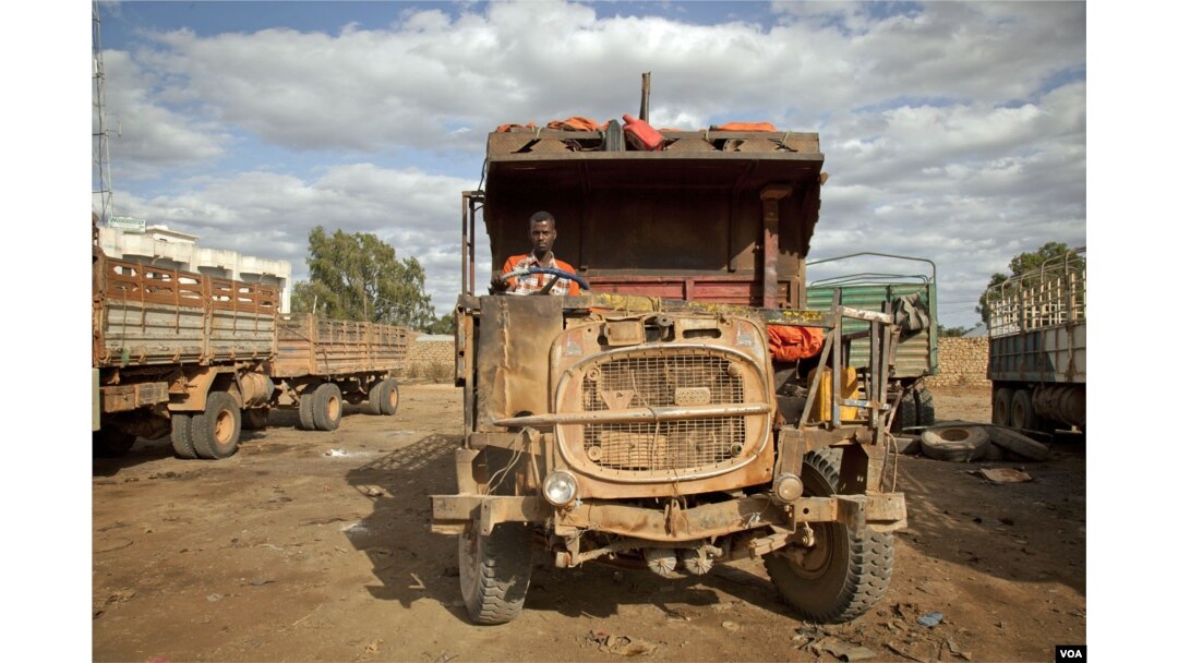 Ali Hassan Abdi drives a truck between Mogadishu and Baidoa. He keeps his truck in a state of disrepair to avoid heavier taxes at al- Shabaab checkpoints, August 24, 2012.