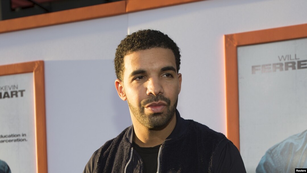 FILE - Rapper Drake poses at the premiere of "Get Hard" at the TCL Chinese theatre in Hollywood, California.