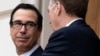 US Trade Representative Robert Lighthizer (R) and US Treasury Secretary Steven Mnuchin (L) await the arrival of Chinese Vice Premier Liu He at the Office of the US Trade Representative for trade negotiations in Washington, DC, May 10, 2019.
