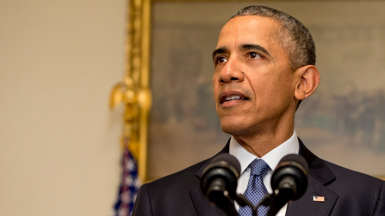 President Barack Obama speaks about the Paris climate agreement from the Cabinet Room of the White House in Washington, Dec. 12, 2015.