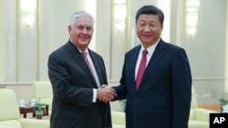 2017年9月30日，中国国家主席习近平在北京人民大会堂会晤到访的美国国务卿蒂勒森。