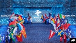 各个冬奥队出席2022北京冬奥会闭幕式。（美联社2022年2月20日）