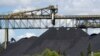 FILE - coal stack at a train loading facility near Muswellbrook in the Hunter Valley, Australia, Nov. 2, 2021. Activists want all mining projects in Australia to be properly assessed for their potential impact on climate change. 