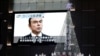 在日本东京街头的一个大型电视屏幕上播放有关日产汽车公司前董事长卡洛斯·戈恩被逮捕的新闻。 （2018年11月21日）