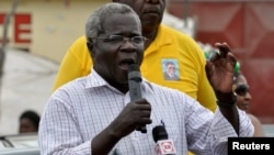 FILE - Afonso Dhlakama, head of Mozambique's opposition party Renamo, addresses an election rally in Matola, near Maputo, Mozambique, Oct. 25, 2009. 