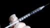 A syringe.