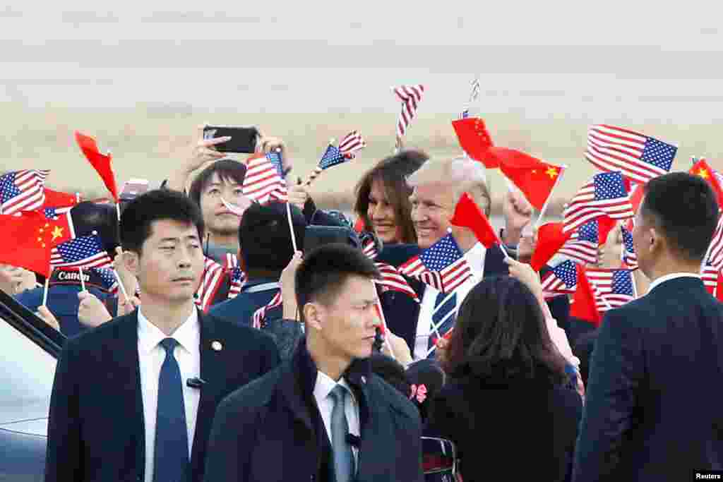 U.S. President Donald Trump and first lady Melania Trump arrive at Beijing airport, China.